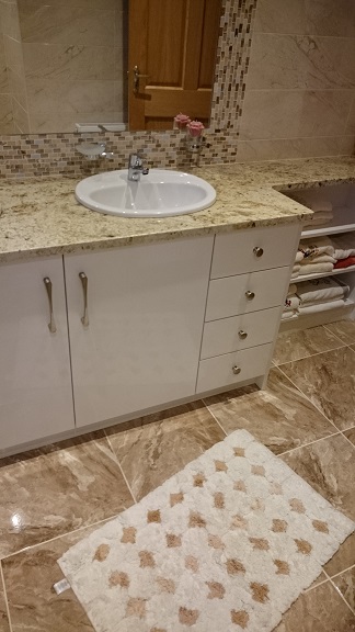 Bespoke Bathroom Unit With White High Gloss Granite Worktop