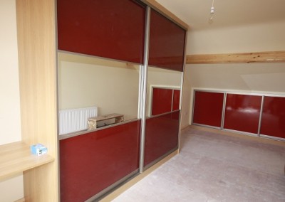 Red Mirrored Built In Wardrobe And Attic Storage
