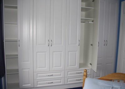 White Vinyl Door Fitted Wardrobe With Soft Close Drawers